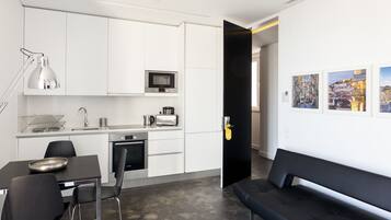 Fridge, microwave, stovetop, coffee/tea maker