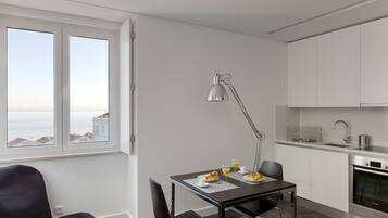 Superior Studio | Living area | TV