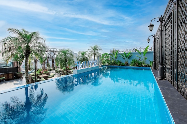 Outdoor pool, pool umbrellas, pool loungers