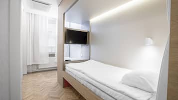 Habitación individual, 1 cama individual | Cortinas blackout, insonorización, wifi gratis y ropa de cama