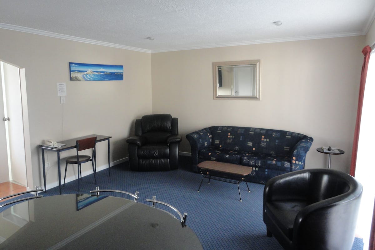 Apartment, 2 Bedrooms | Living room | 42-inch flat-screen TV with digital channels, TV, DVD player