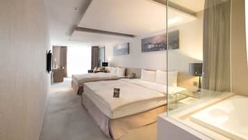 Family Quadruple Room, Bathtub | Down comforters, in-room safe, individually decorated