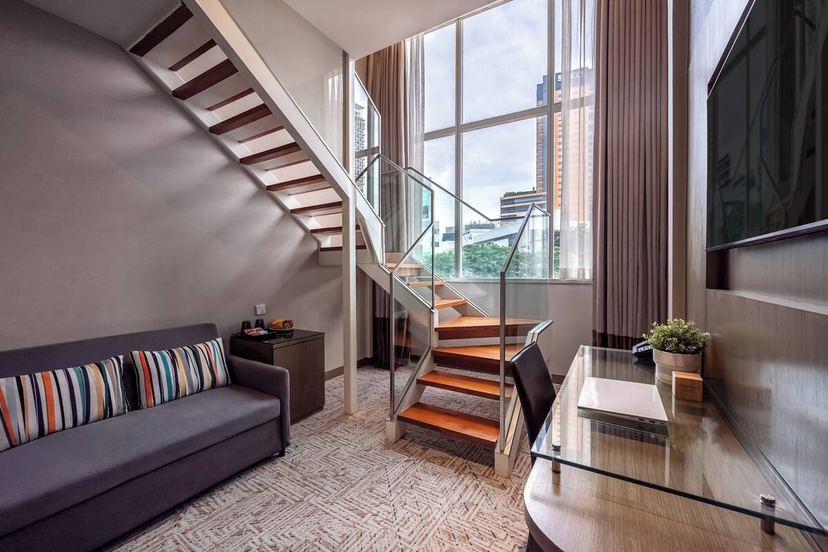 loft room | 1 bedroom, minibar, in-room safe, desk