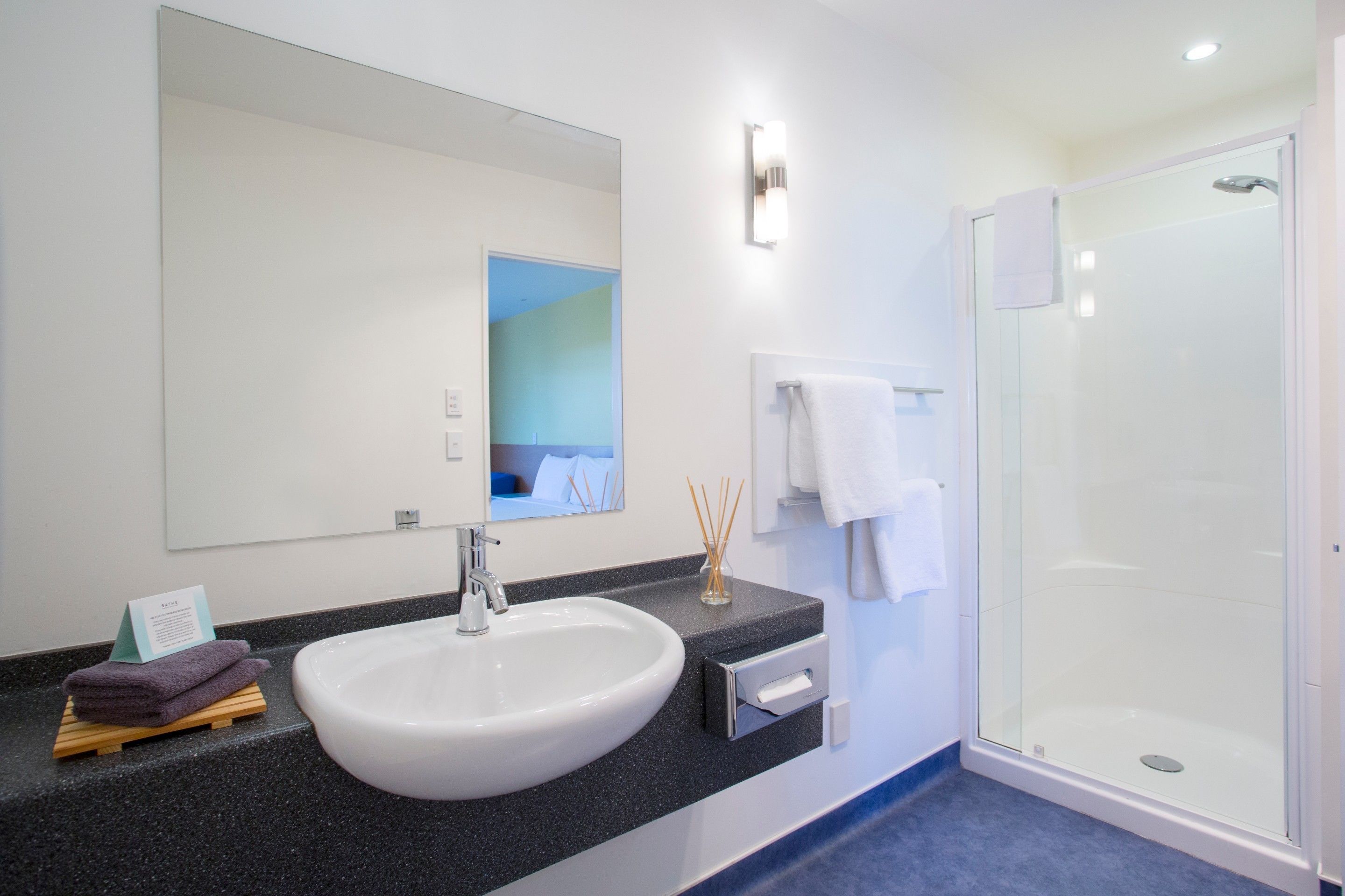 standard studio, courtyard area | bathroom | shower, hair dryer, towels