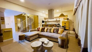 Penthouse Apartment | Living area | 45-inch LCD TV with satellite channels, TV