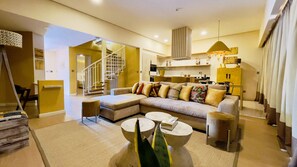 Penthouse Apartment | Living area | 45-inch LCD TV with satellite channels, TV - Kabira Country Club (Kampala)