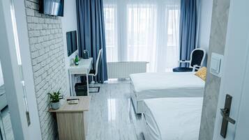 Classic-Doppel- oder -Zweibettzimmer | Schreibtisch, Bügeleisen/Bügelbrett, Zustellbetten, kostenloses WLAN