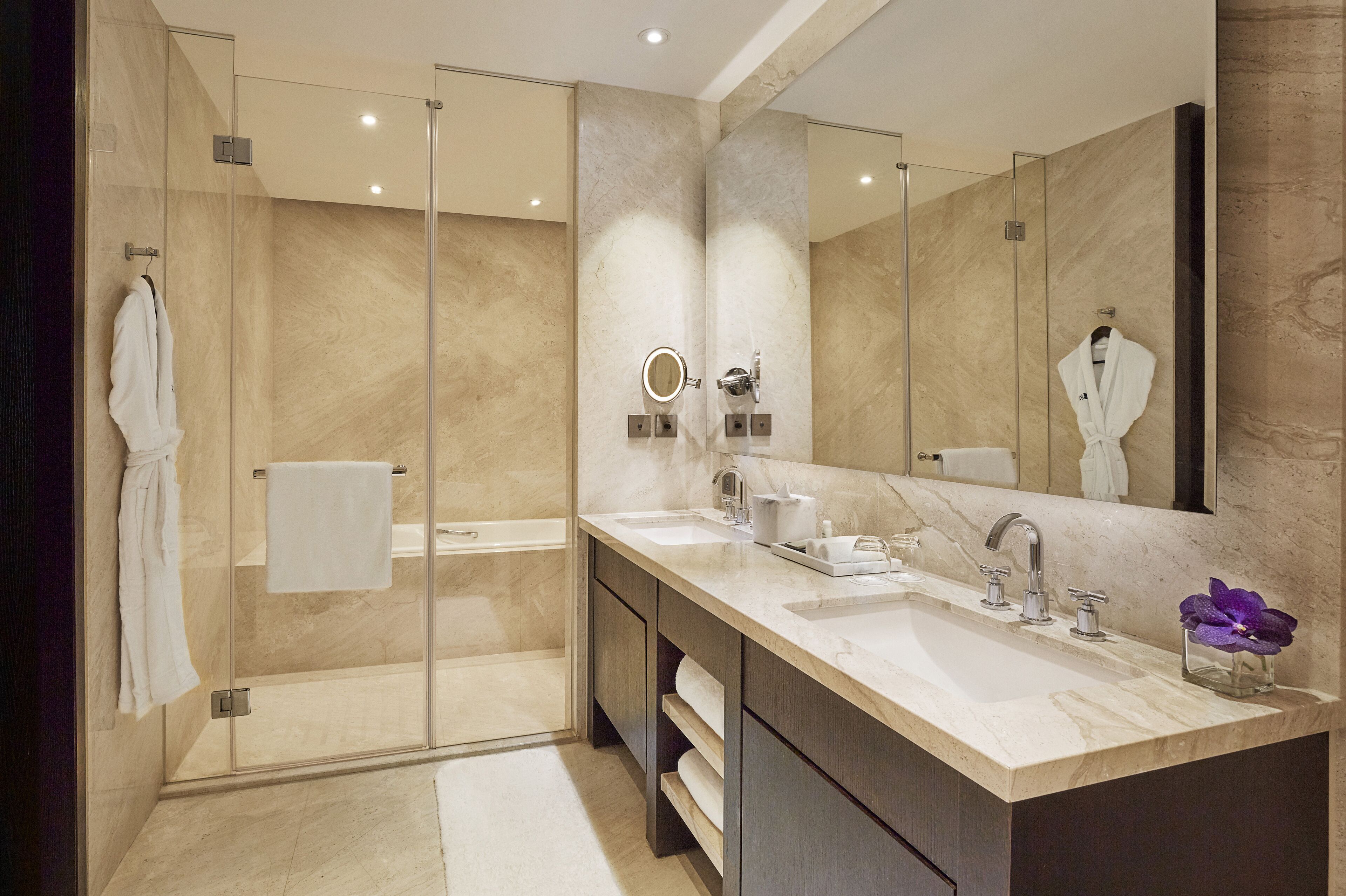 separate bathtub and shower, deep-soaking bathtub, designer toiletries