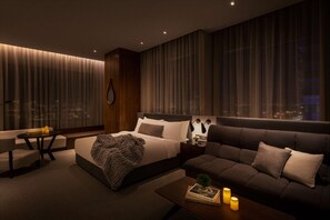 Premium bedding, down comforters, in-room safe, desk