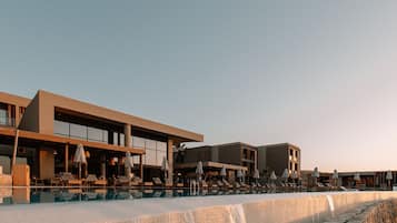 Seasonal outdoor pool, pool umbrellas, pool loungers