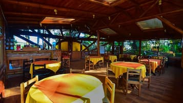 Breakfast, lunch, dinner served; international cuisine, garden views