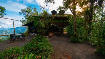 Escape to a serene mountain retreat with a panoramic view of the surrounding landscape.