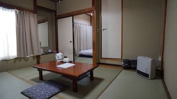 Triple Room, Private Bathroom | Living area | LED TV