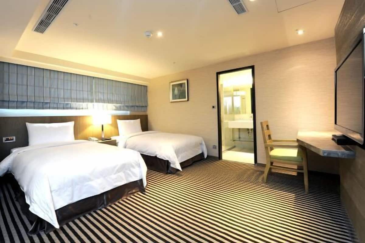Down duvets, pillow-top beds, minibar, desk