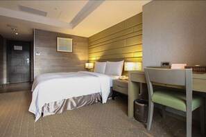Habitación doble superior | Edredón, camas con pillow-top, minibar y decoración personalizada 