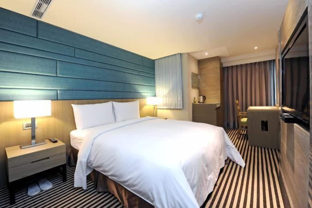 Down duvets, pillow-top beds, minibar, desk