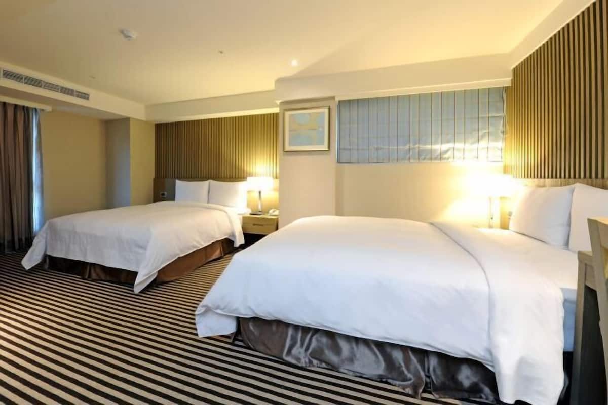 Down duvets, pillow-top beds, minibar, desk