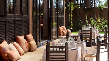 Breakfast, lunch, dinner served; international cuisine, pool views