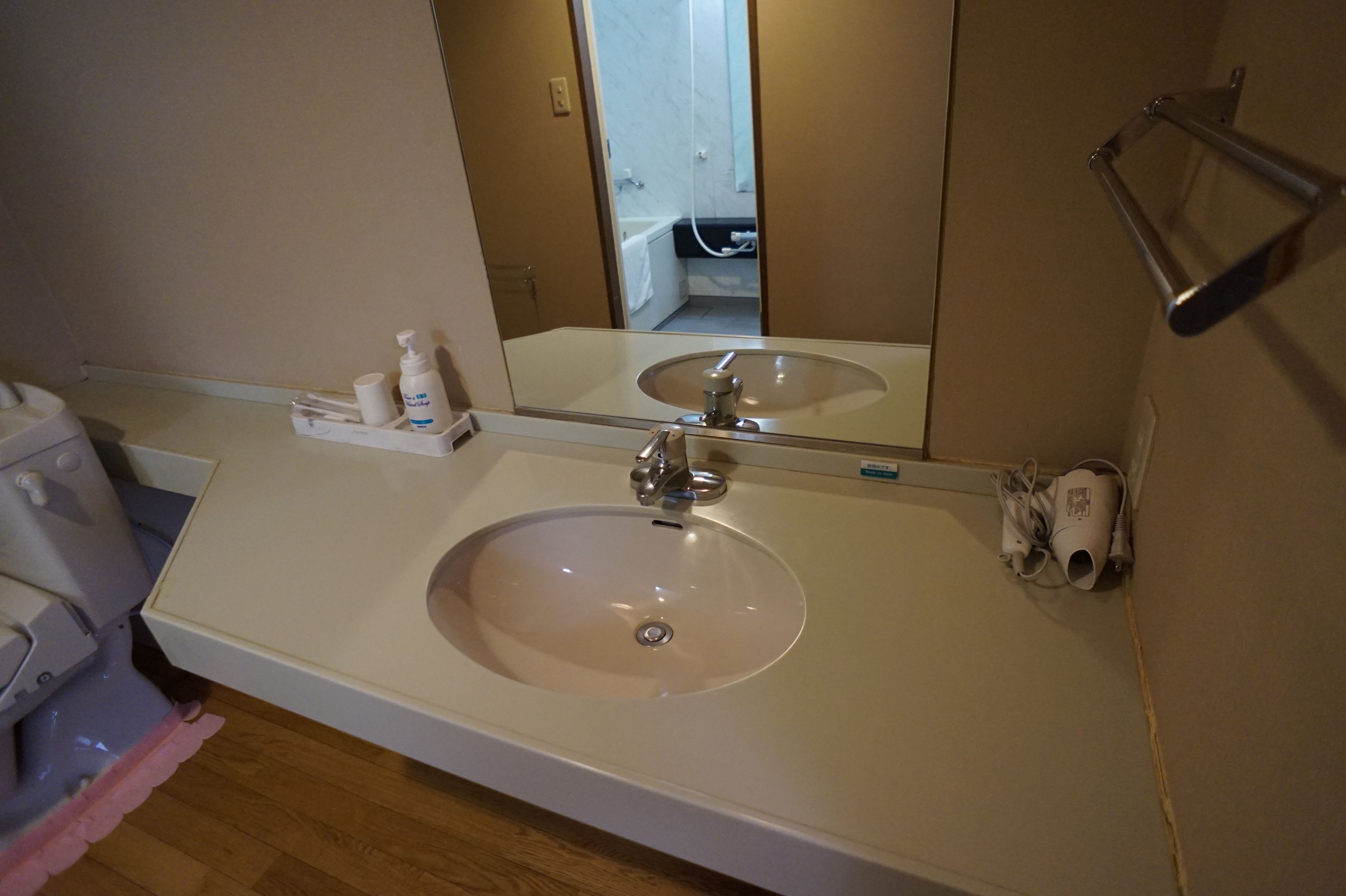 deluxe quadruple room, japanese futon | bathroom amenities | free toiletries, hair dryer, slippers, towels