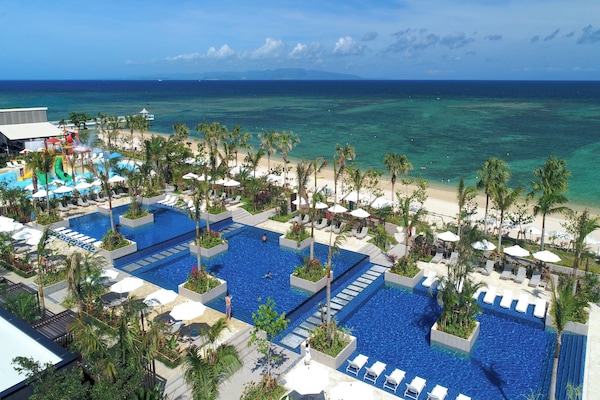 Indoor pool, outdoor pool, open 9:00 AM to 8:00 PM, cabanas (surcharge)