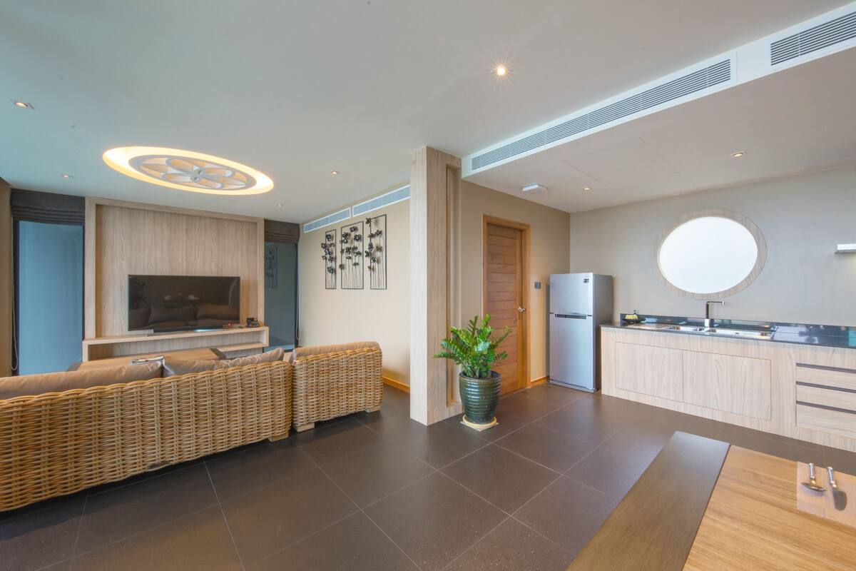 villa, 2 bedrooms, sea view | living area | 55-inch tv with premium tv channels, fireplace