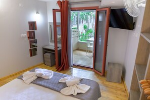 Apartment, Garden View | In-room safe, desk, laptop workspace, soundproofing - Rouda Bay Hotel (Lefkada)