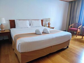 Chambre Double Deluxe | Literie de qualité supérieure, matelas Select Comfort, minibar