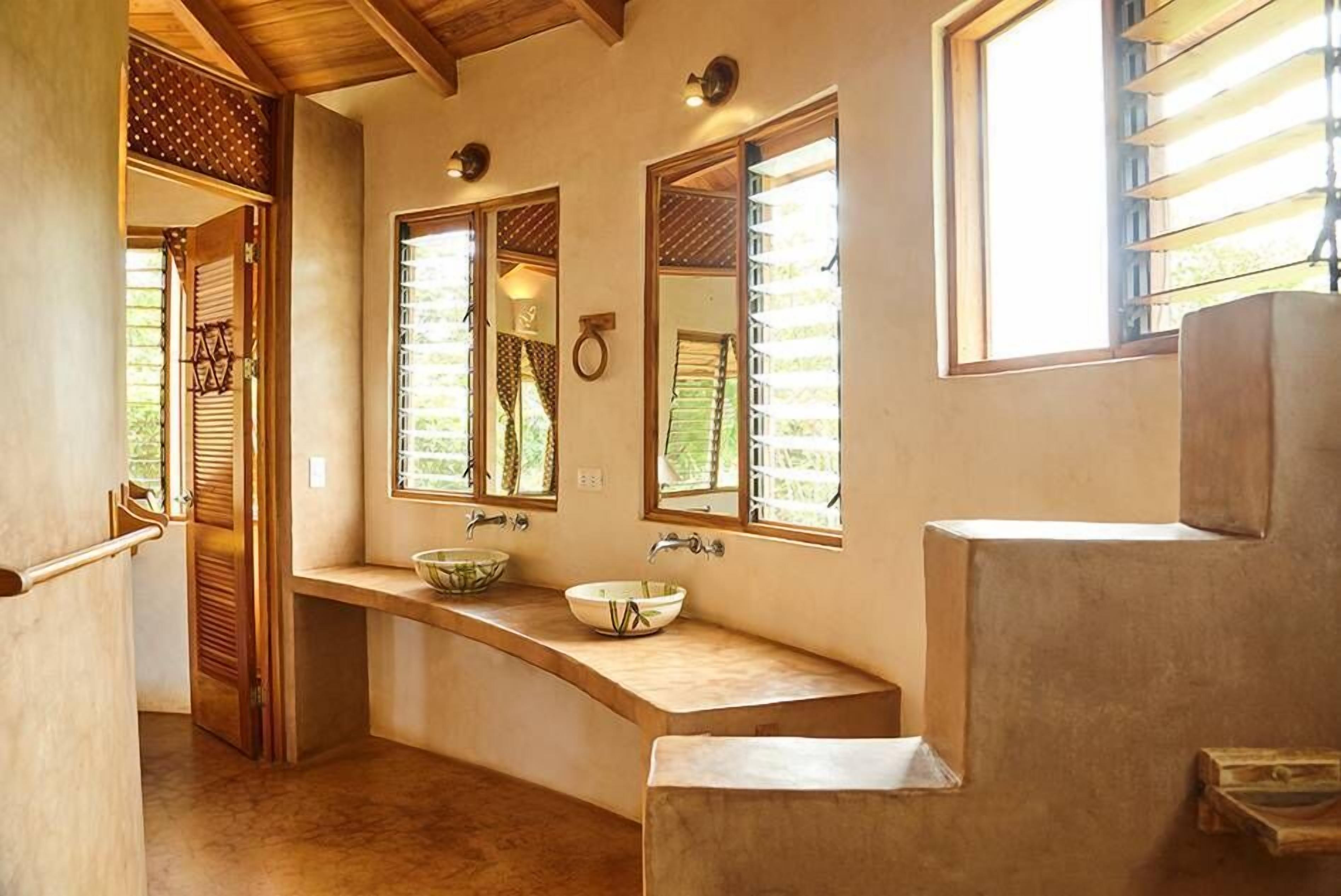 ac suite bungalow | bathroom | shower, free toiletries, towels