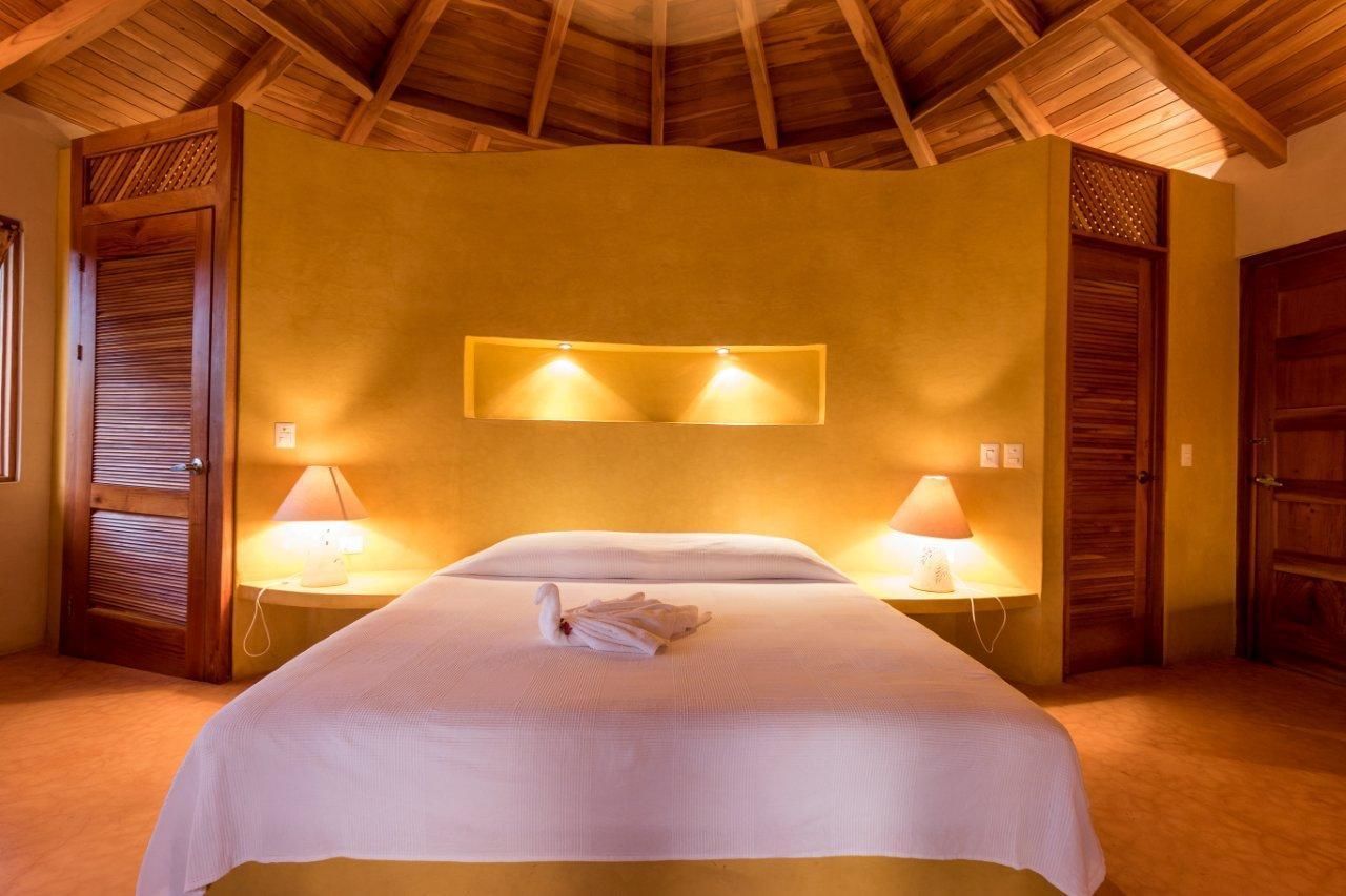 ac suite bungalow | in-room safe, individually decorated, desk, free cots/infant beds