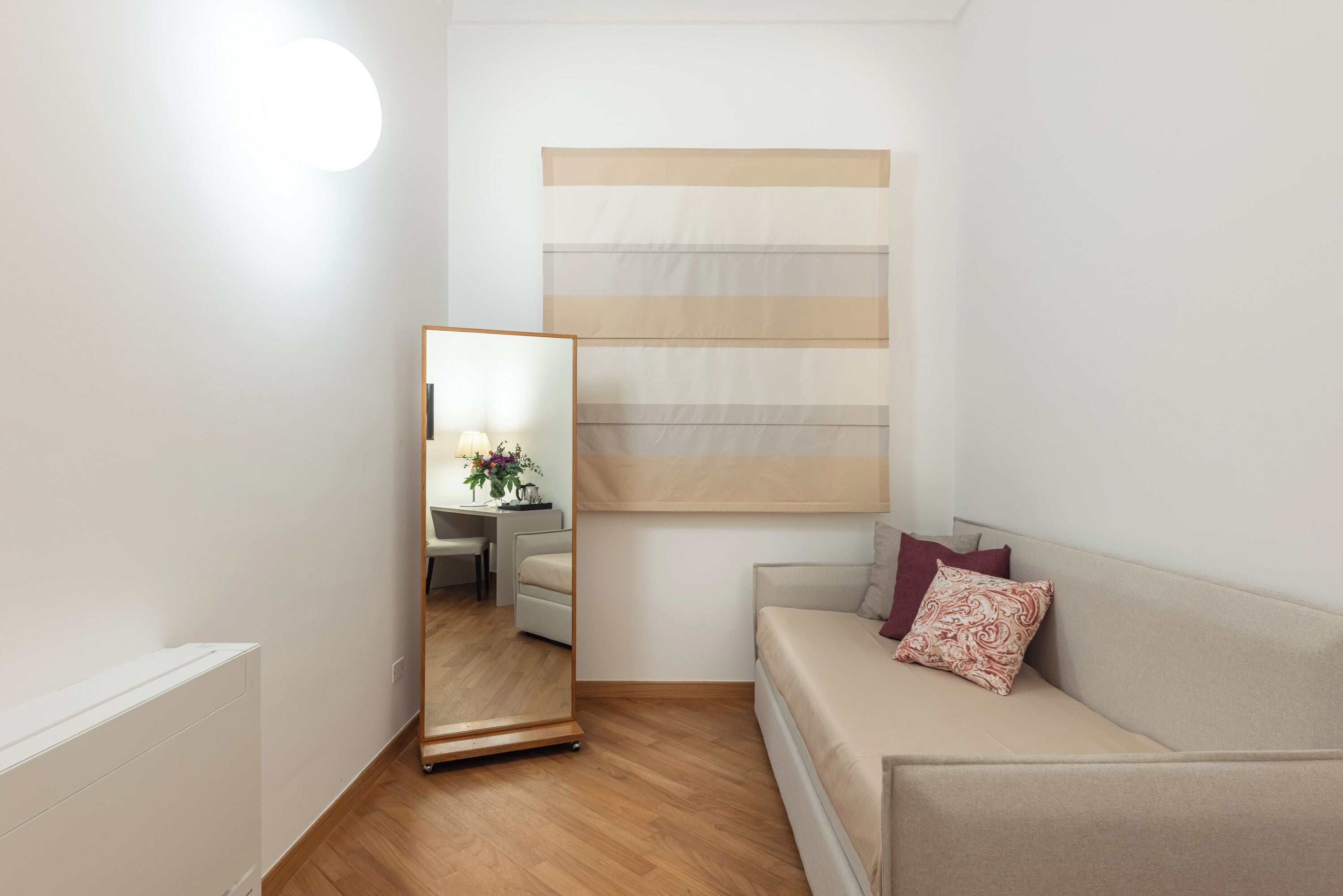 family room | minibar, in-room safe, desk, blackout curtains