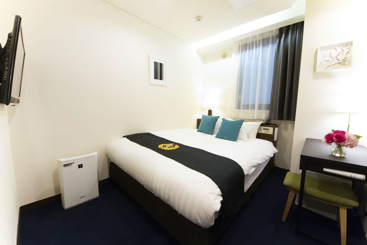 Down duvets, desk, iron/ironing board, free WiFi