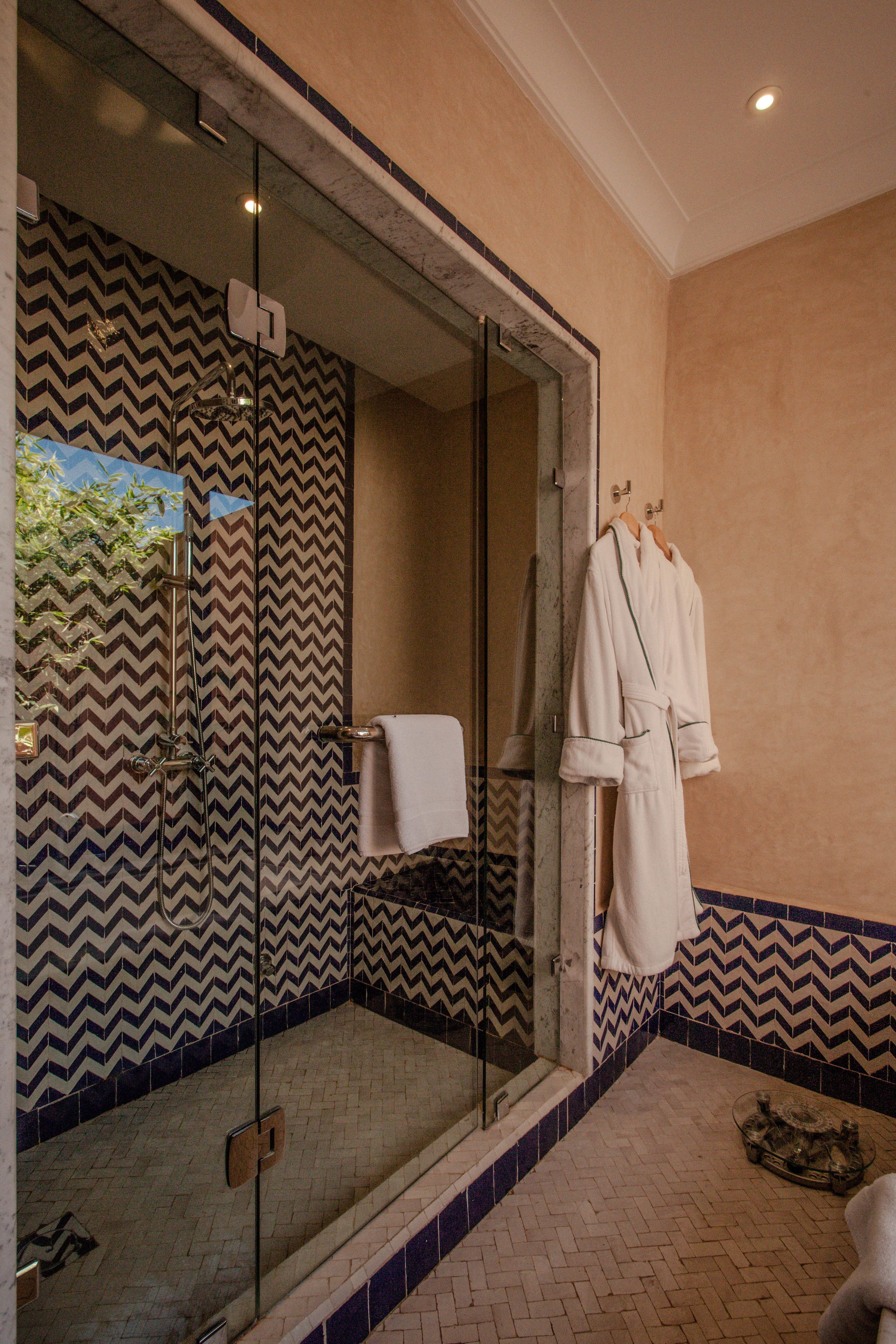 grand pool villa | bathroom | deep-soaking bathtub, hair dryer, dressing gowns, bidet