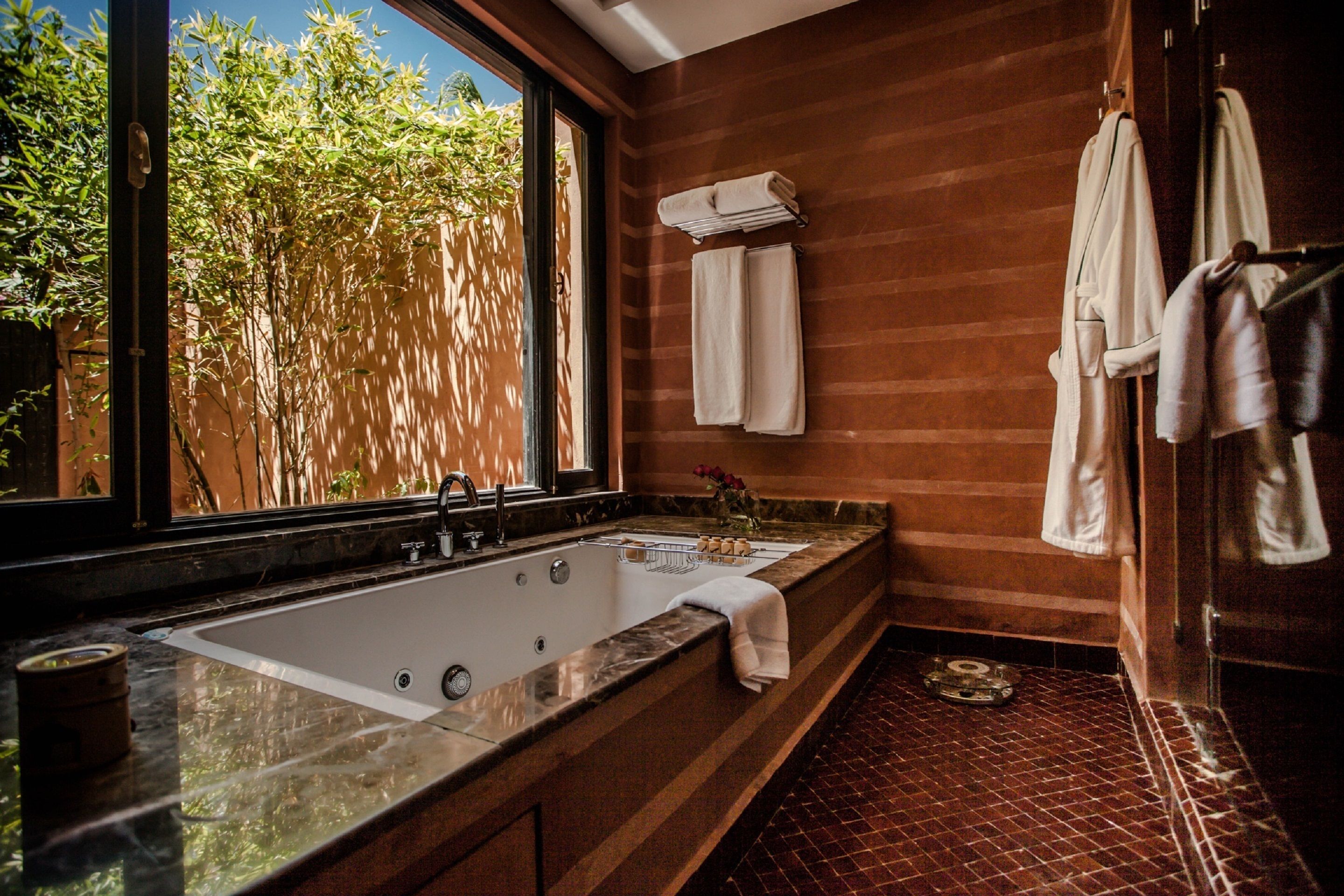 deep-soaking bathtub, hair dryer, dressing gowns, bidet