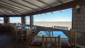 Breakfast, lunch served; local and international cuisine, beach views