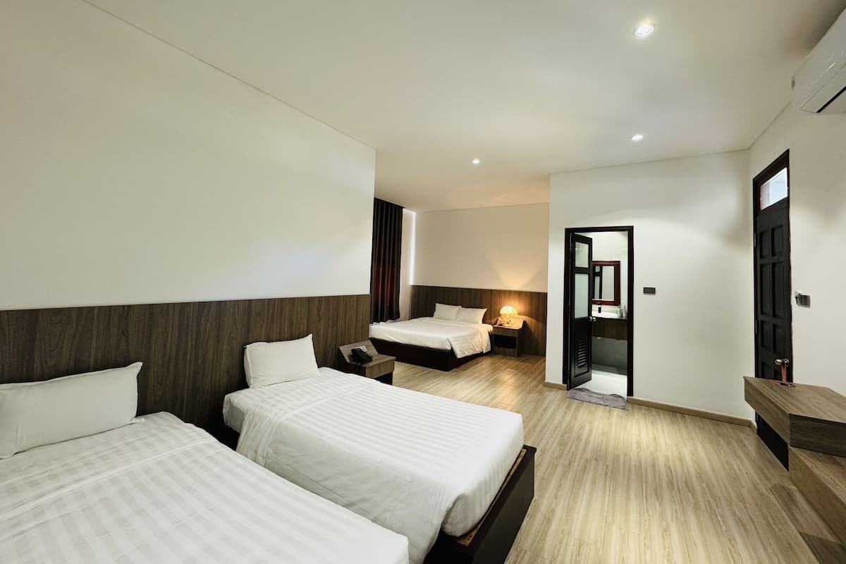 Deluxe Family Room, Garden View (4pax) | Minibar, in-room safe, desk, blackout drapes