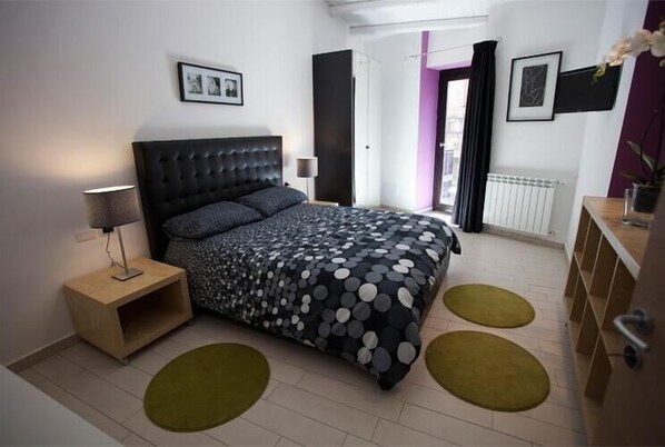 Down duvets, desk, blackout curtains, iron/ironing board