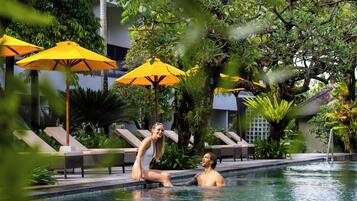 2 outdoor pools, open 9:00 AM to 9:00 PM, pool umbrellas, pool loungers