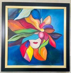 A framed painting with abstract floral and geometric elements. - Hotel Galerias Hn (San Pedro Sula)