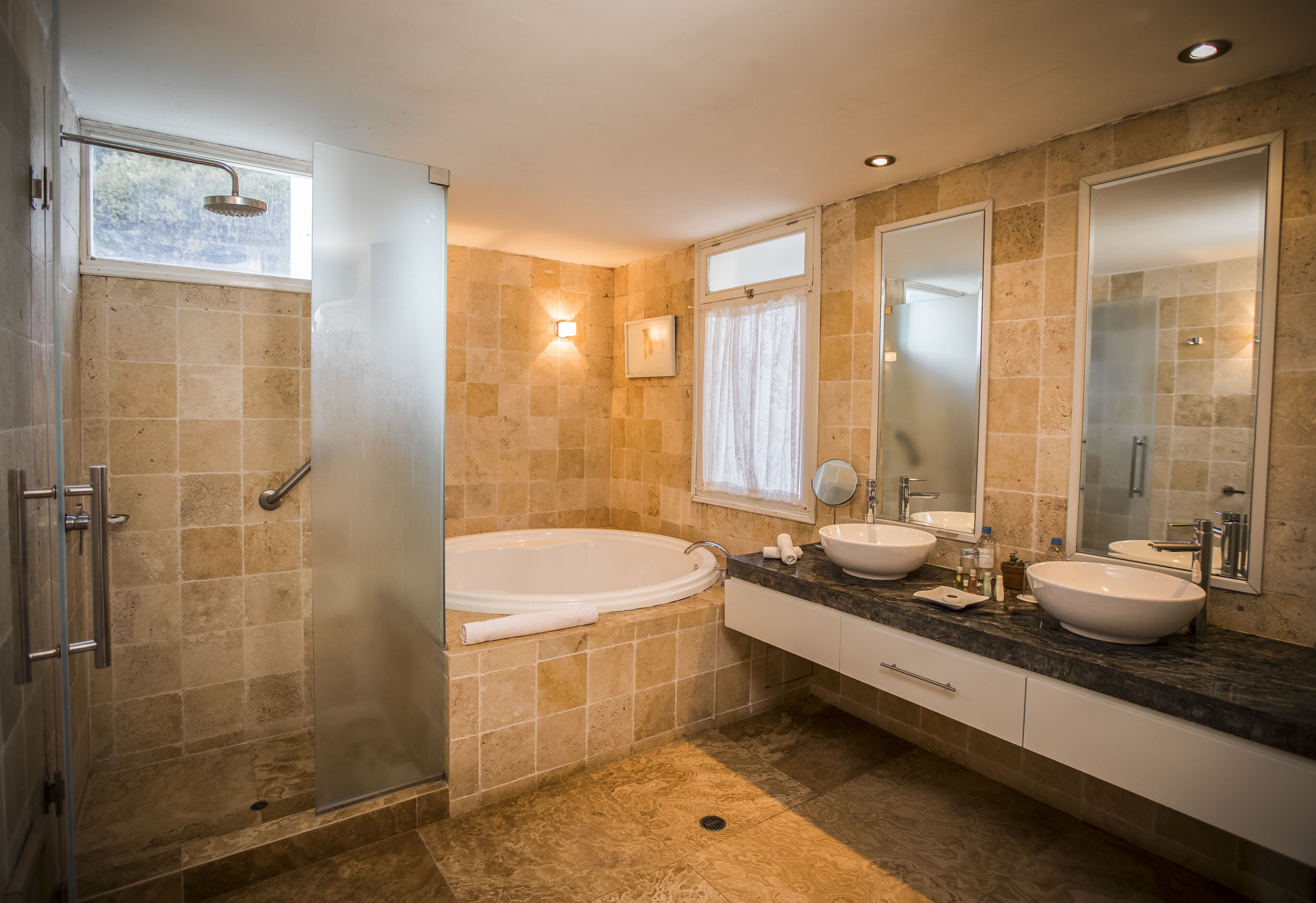 deluxe room, 1 king bed | bathroom | bathtub, hair dryer, towels