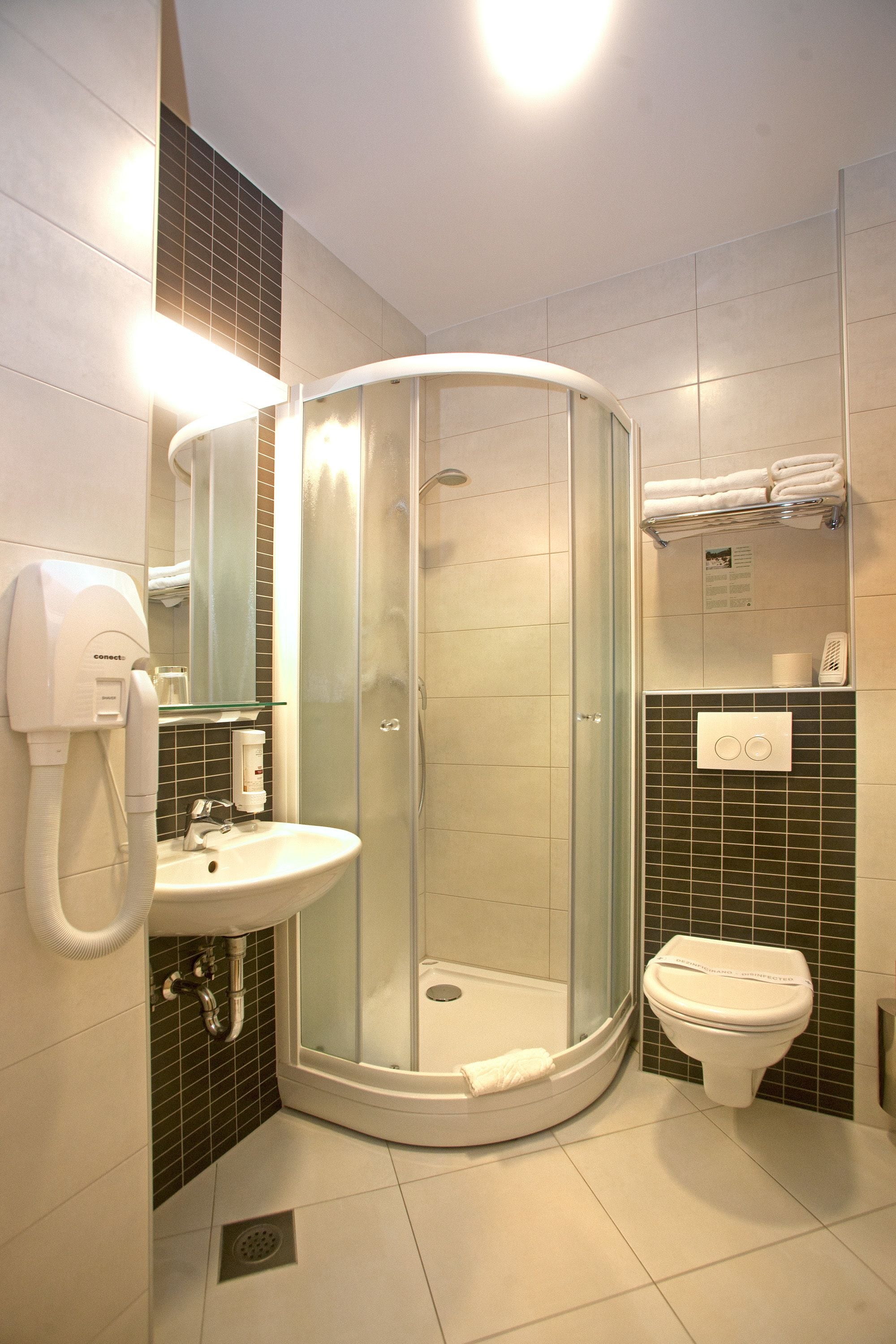 suite with 2 bedrooms | bathroom | shower, rainfall showerhead, hair dryer, slippers