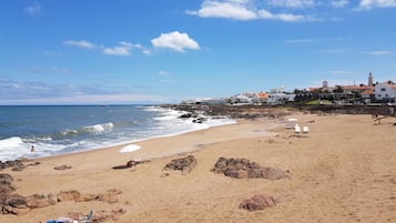 Beach nearby, beach umbrellas, beach towels