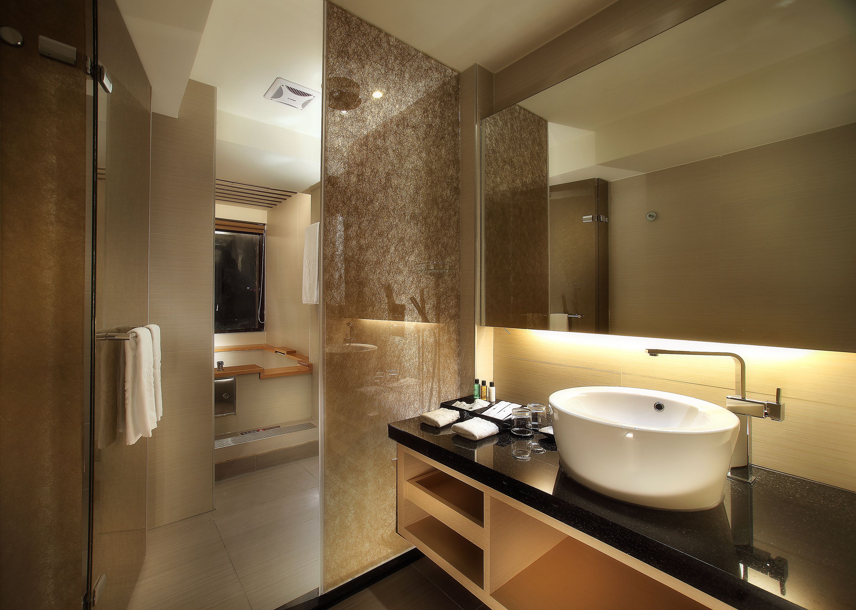 separate bathtub and shower, deep-soaking bathtub, rainfall showerhead