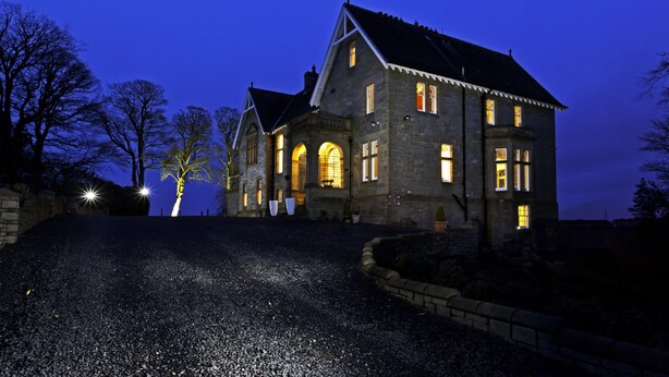 A large stone building with multiple windows and a prominent entrance. - Balmule House (Dunfermline)