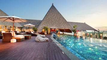 Outdoor pool, open 8:00 AM to 8:00 PM, pool umbrellas
