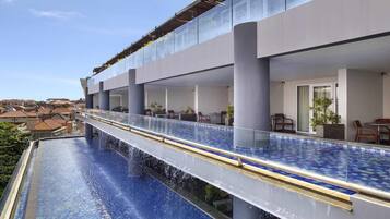 Deluxe Room, 1 King Bed (Plunge Pool) | In-room safe, desk, laptop workspace, blackout drapes