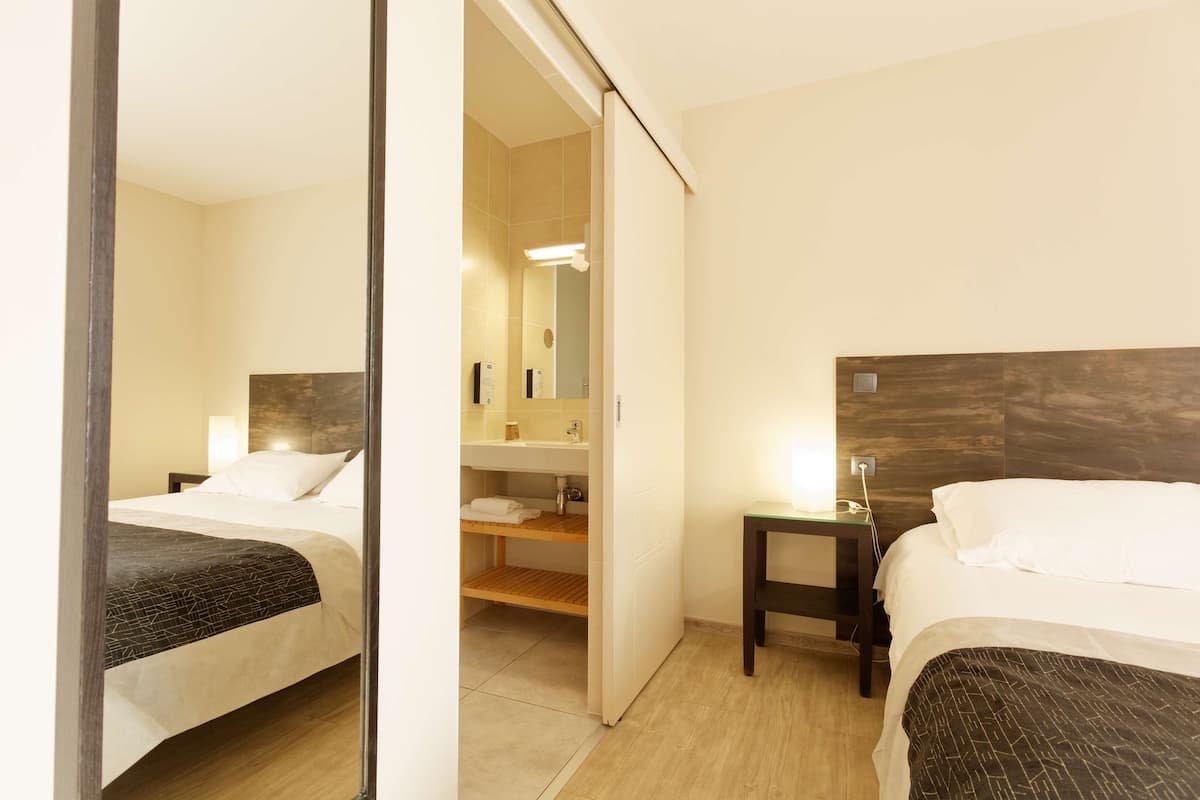 Desk, blackout drapes, soundproofing, free cribs/infant beds