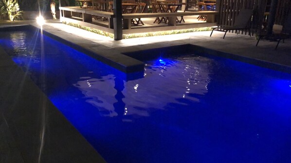 Outdoor pool, pool umbrellas, sun loungers