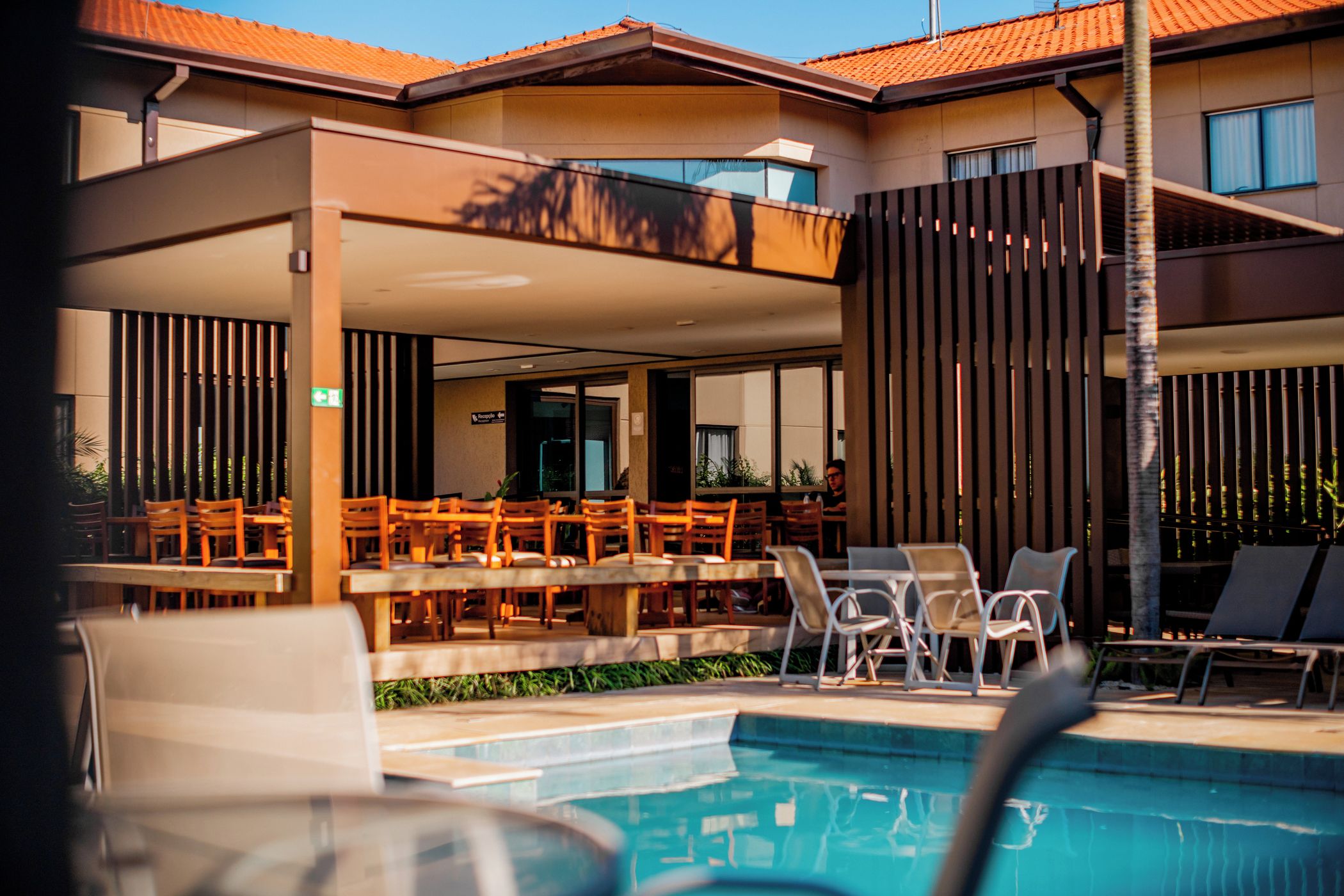 Outdoor pool, pool umbrellas, sun loungers