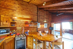 Waterfront Chalet | Private kitchen | Full-sized fridge, microwave, oven, stovetop