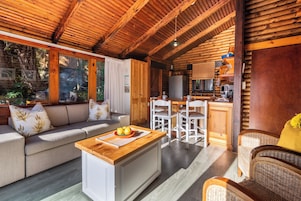 Middle Chalet | Living area | 40-inch flat-screen TV with satellite channels, TV, DVD player